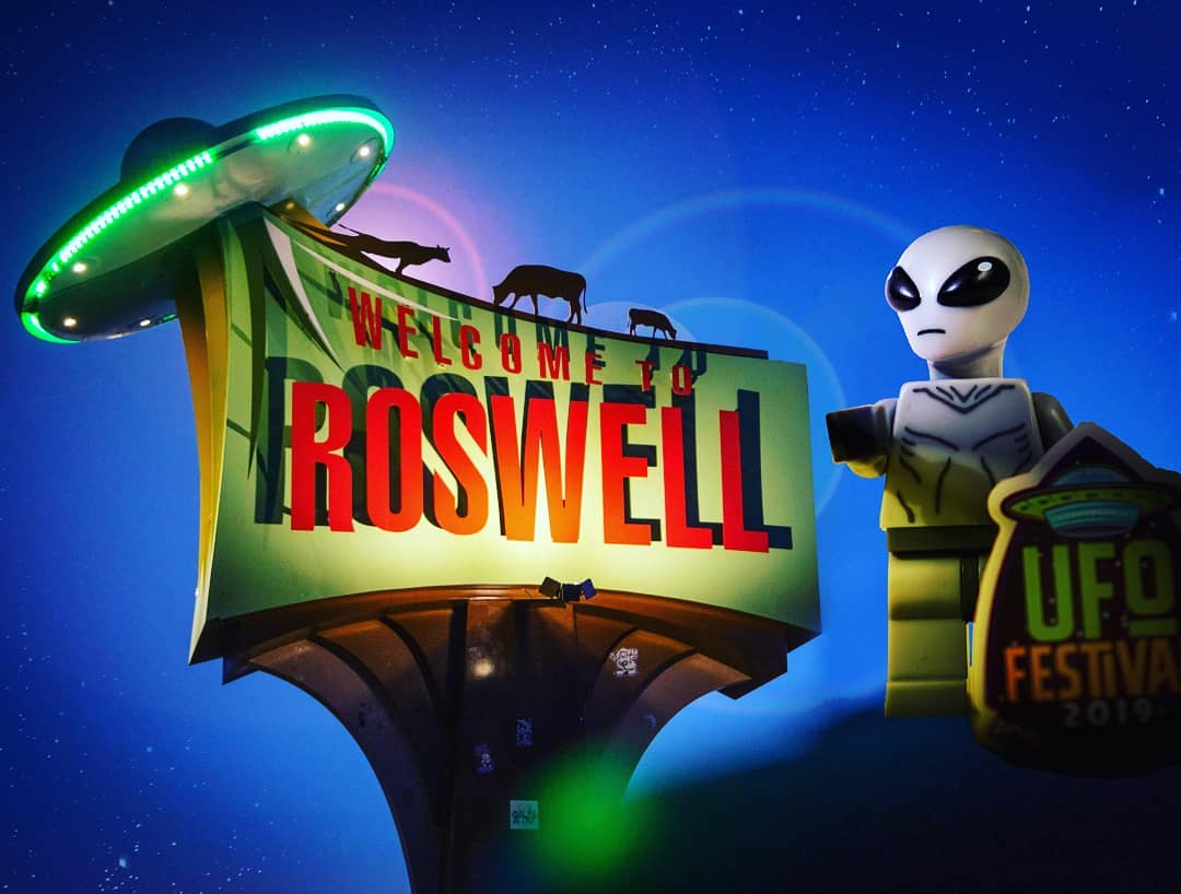 Roswell sign_night_with UFO's image